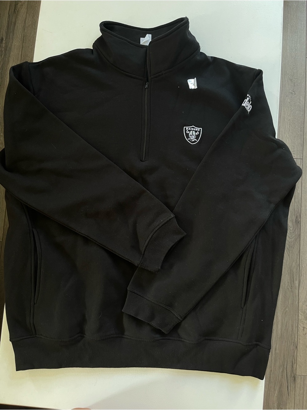Men's Black Half-Zip Pullover Sweater raiders x modelo